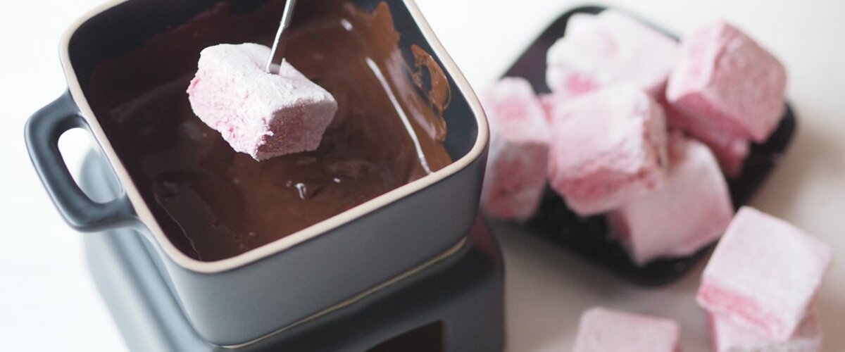 Delicious chocolate fondue with marshmallows